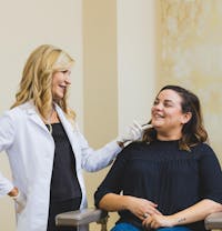 dr hazen touching a woman's chin