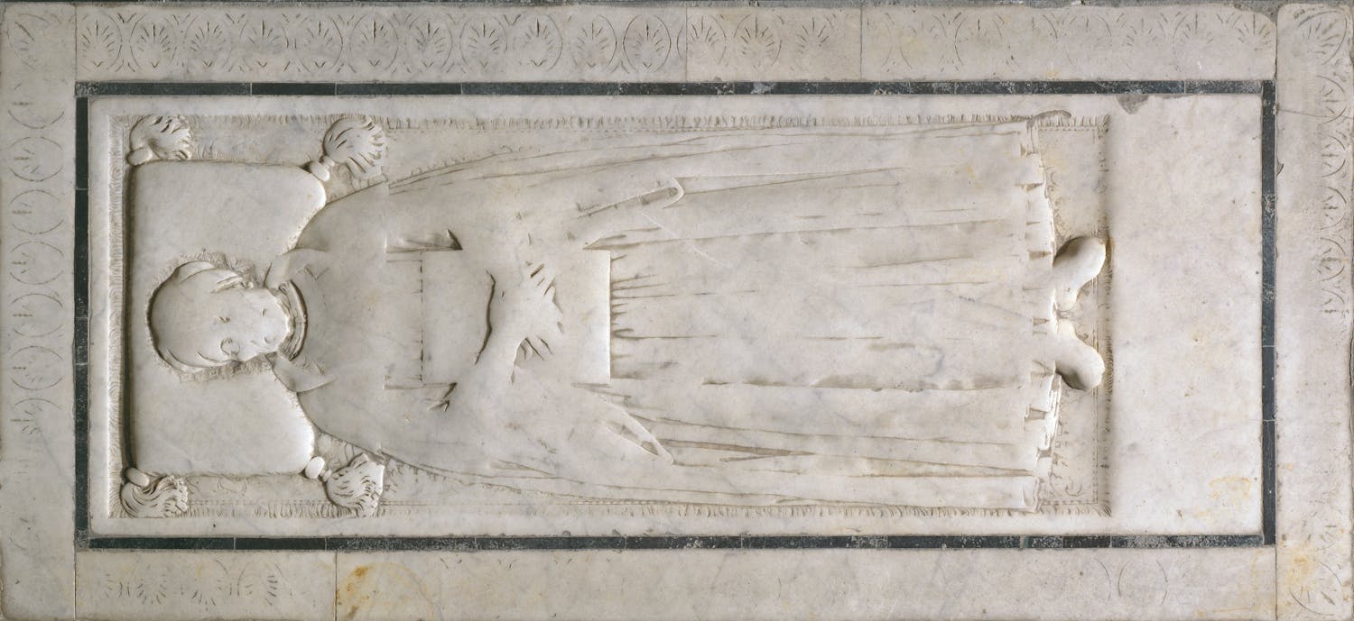 Tomb slab of Gregorio Marsuppini and his descendants, c. 1455. Basilica of Santa Croce, north aisle