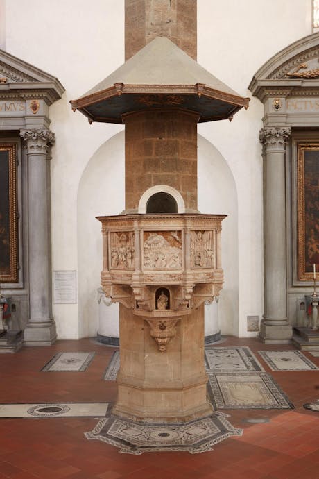 Benedetto da Maiano, Pulpito con “Storie di san Francesco”, 1481-1487, marmo bianco di Seravezza, marmo rosso di Maremma con dorature, lacca e tarsie di vetro. Firenze, Santa Croce, navata centrale Benedetto da Maiano, Pulpito con “Storie di san Francesco”, 1481-1487, marmo bianco di Seravezza, marmo rosso di Maremma con dorature, lacca e tarsie di vetro. Firenze, Santa Croce, navata centrale