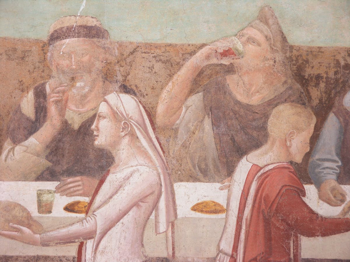 Taddeo Gaddi, "San Ludovico di Tolosa serve a mensa i poveri", particolare dell' “Albero della Vita e Ultima Cena”, 1345-1350 circa, affresco staccato. Firenze, Santa Croce, Cenacolo Taddeo Gaddi, "San Ludovico di Tolosa serve a mensa i poveri", particolare dell' “Albero della Vita e Ultima Cena”, 1345-1350 circa, affresco staccato. Firenze, Santa Croce, Cenacolo