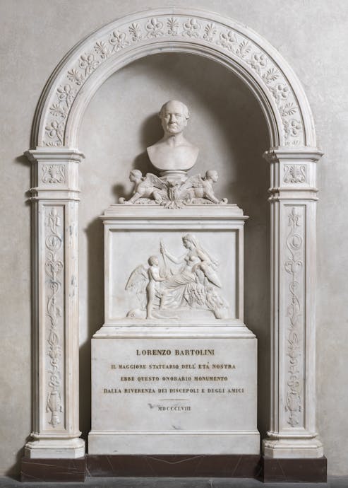 Pasquale Romanelli e Tommaso Gasperini, “Monumento di Lorenzo Bartolini”, 1858, marmo. Firenze, Santa Croce, Noviziato, corridoio Pasquale Romanelli e Tommaso Gasperini, “Monumento di Lorenzo Bartolini”, 1858, marmo. Firenze, Santa Croce, Noviziato, corridoio