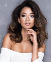 Attractive woman with smooth and glowing looking skin.