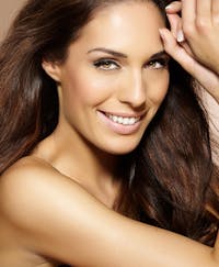 Beautiful woman with refreashingly smooth looking skin.