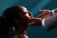 Female patient examined by doctor