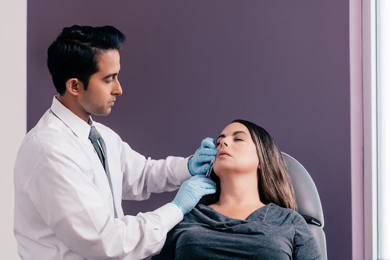 DR. Rana using BOTOX on female patient