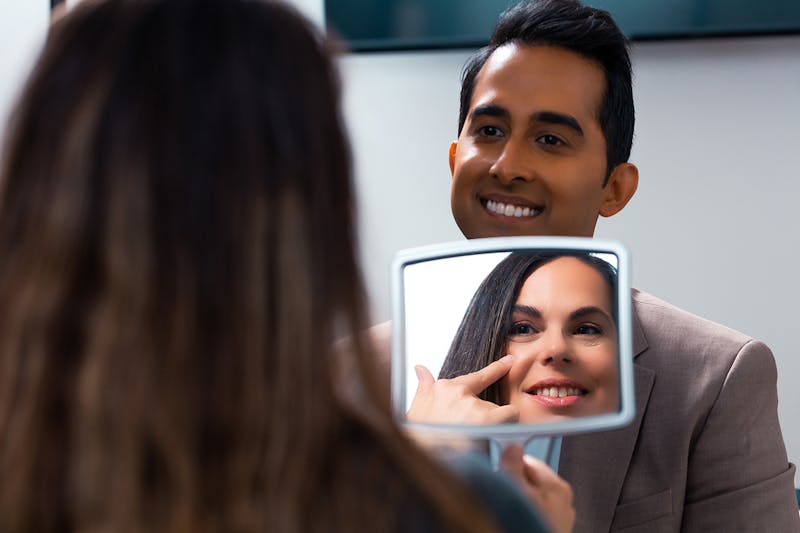 Dr. Rana Showing Patient their Results