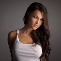 Beautiful woman wearing white tank top.