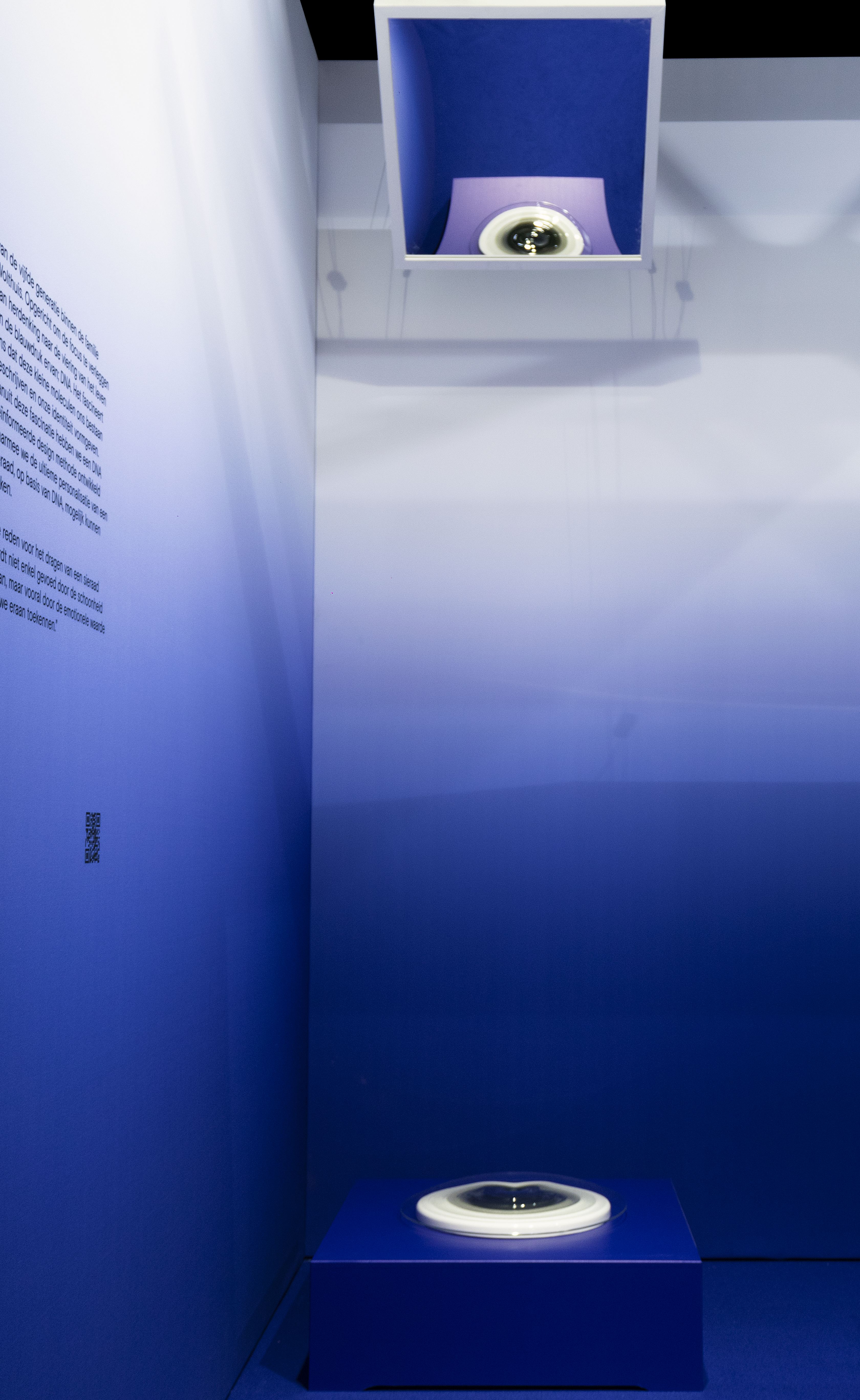 Installation design with an overal blue gradient and 3 suspended mirrors