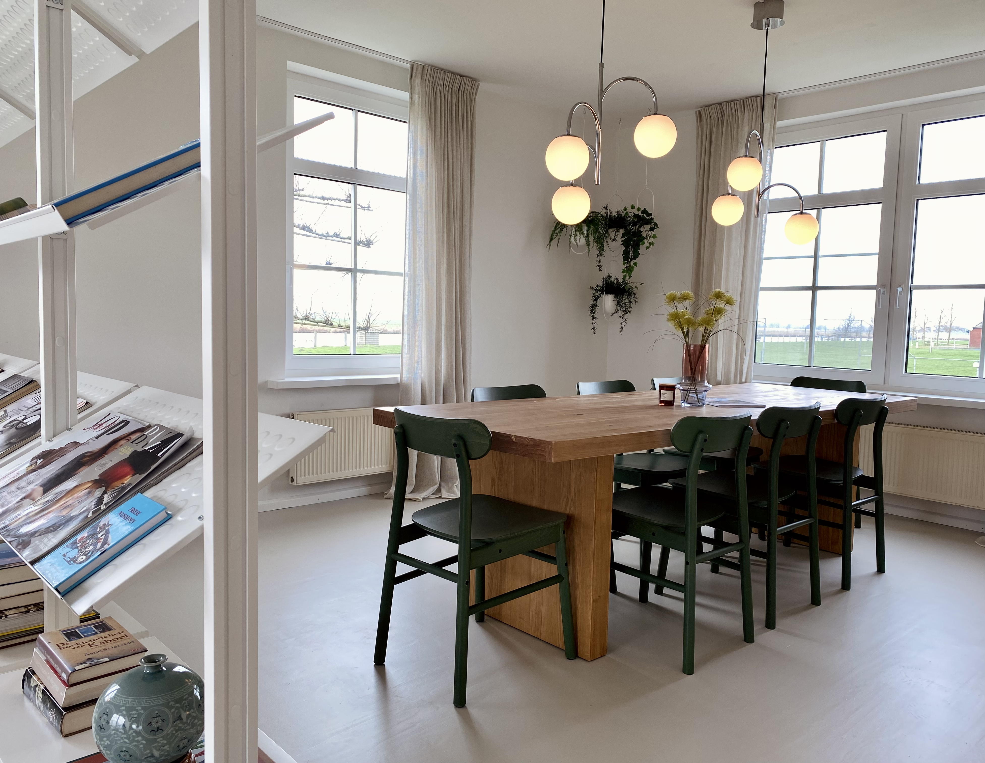 Photo of dining table with retro chandeliers