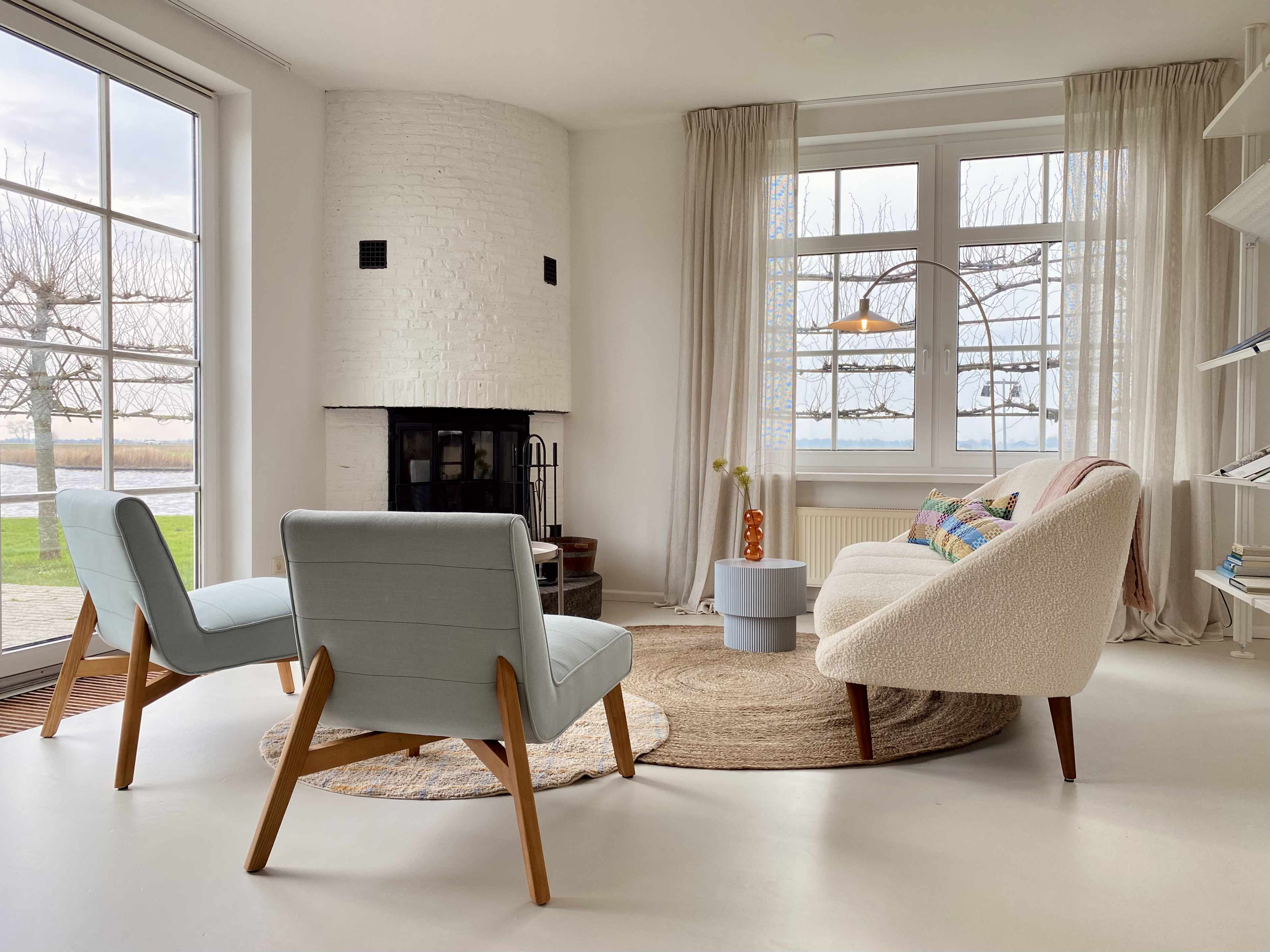 Photo of lounge area by the fireplace