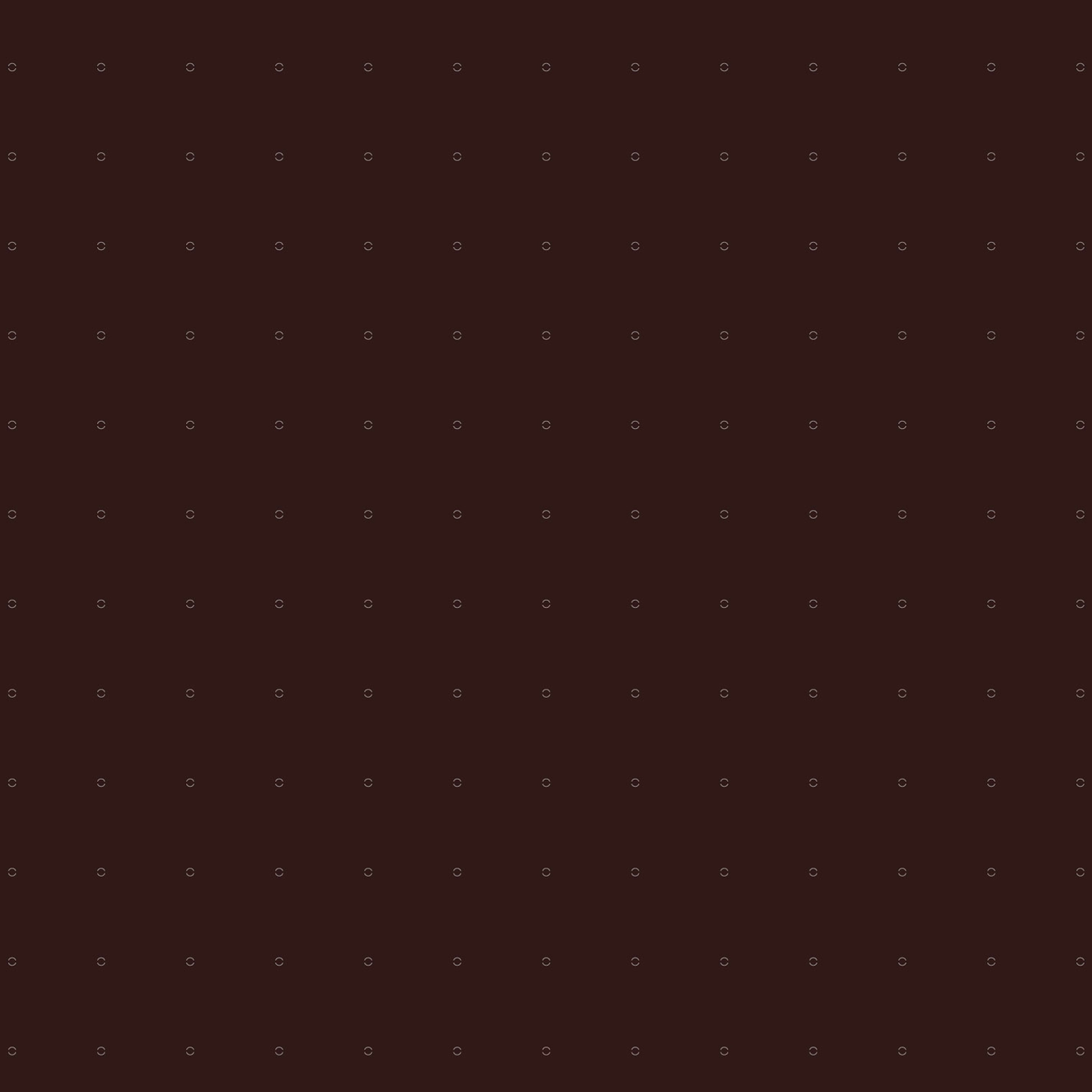 A circle pattern over a brown background.