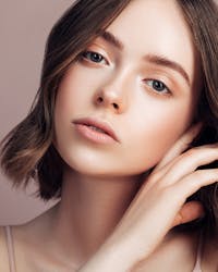 Pretty woman with shoulder length brown hair