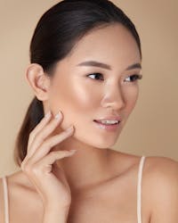 Beautiful Asian woman looking to the side