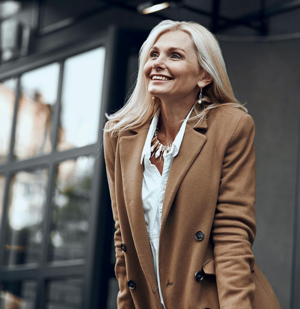 Older Woman smiling outside