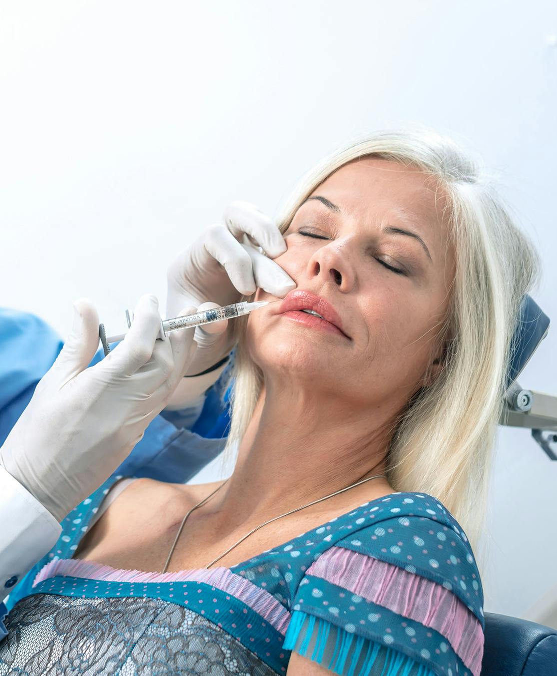 Older lady getting lip injection