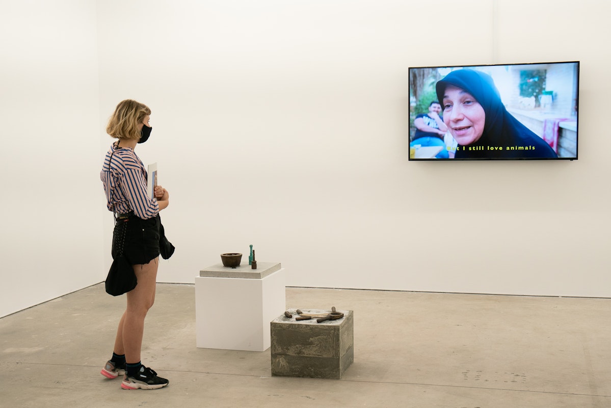 Visitors at the opening of Lara Chamas, The entrance to Paradise lies at your mother's hands, 2021, at Gertrude Contemporary. Photo: Machiko Abe