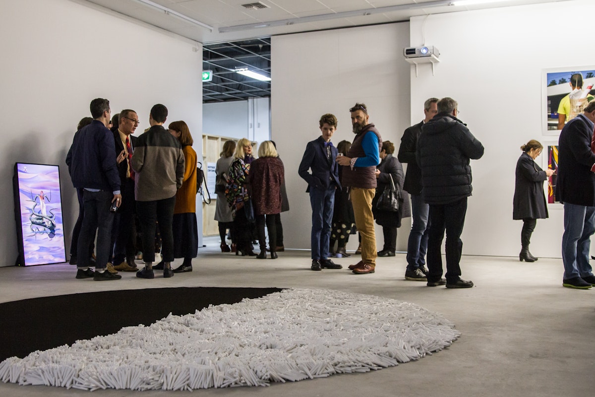 Visitors at the opening of Octopus 17: Forever Transformed, 2017, curated by Georgie Meagher at Gertrude Contemporary. Photo: Alan Weedon.