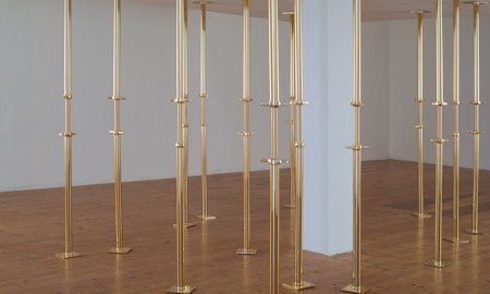 Geoff Kleem, Aegis, 2013. 2200mm 24 karat gold electroplated custom supports, drywall object