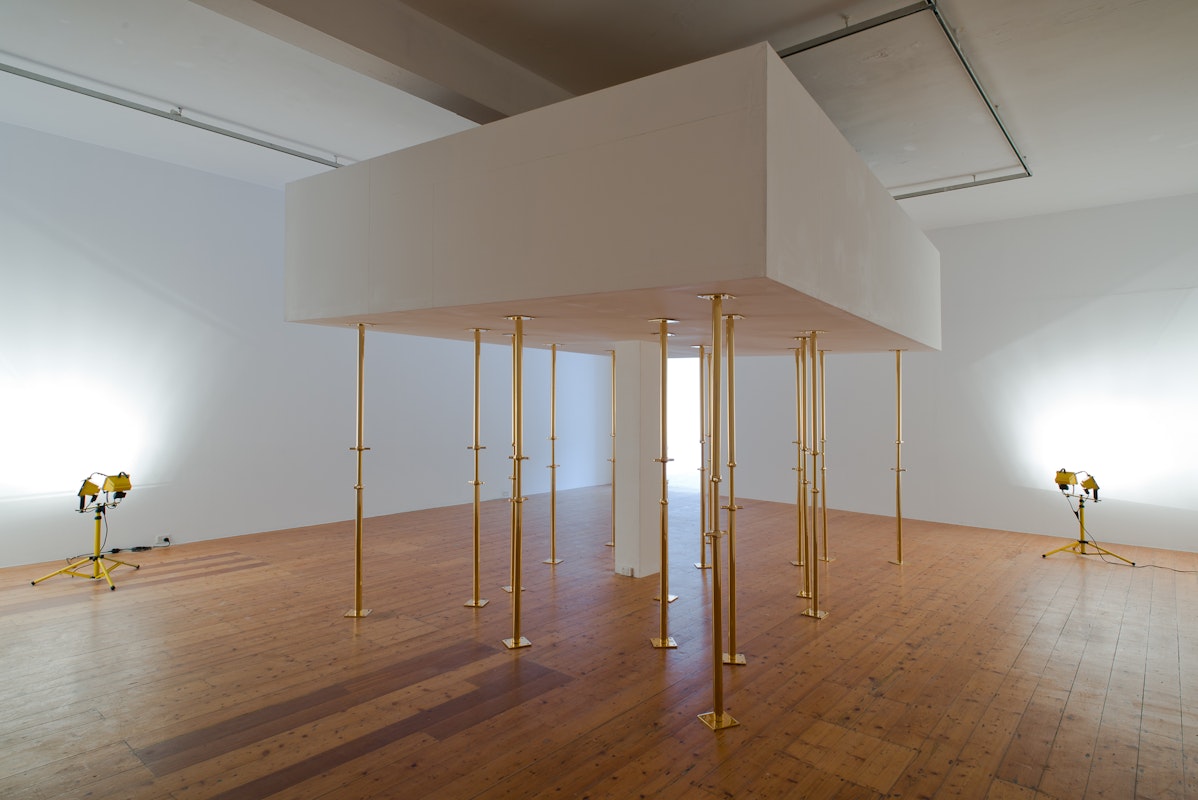 Geoff Kleem, Aegis, 2013. 2200mm 24 karat gold electroplated custom supports, drywall object