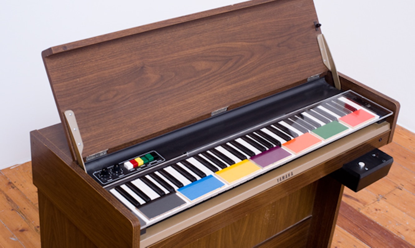 John Nixon, Colour-Music (Music Composition), Painting on Yamaha electric piano with colour coded keys photograph in the artists house, 2008. Courtesy of Anna Schwartz Gallery.