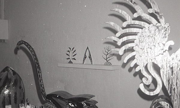 Installation view of Gilding the Lily, curated by Louise Neri, featuring works by Luanne Noble, Philip Faulks, Guiseppe Romeo, Loretta Quinn, Richard Stringer and Tim Jones. Presented at 200 Gertrude Street, 1986. Photo: Courtesy of the Gertrude archive.