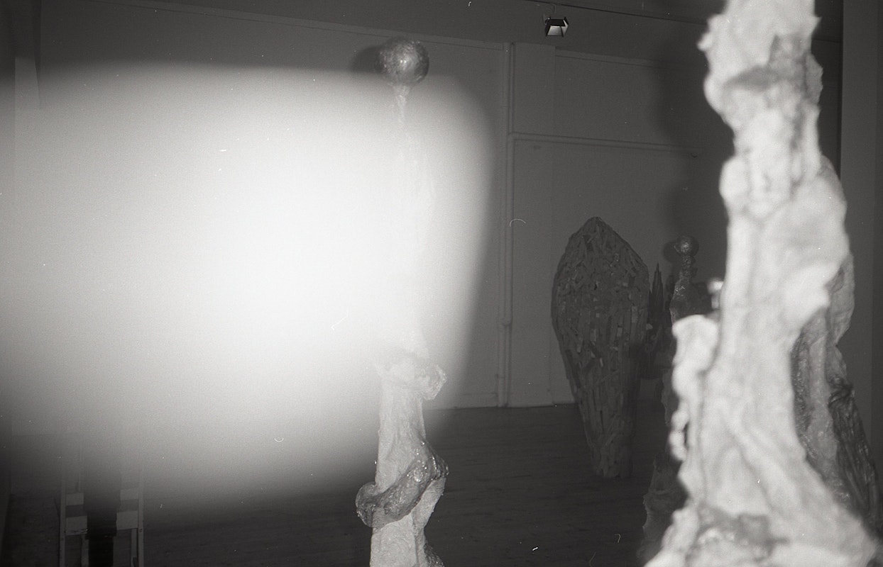 Installation view of Gilding the Lily, curated by Louise Neri, featuring works by Luanne Noble, Philip Faulks, Guiseppe Romeo, Loretta Quinn, Richard Stringer and Tim Jones. Presented at 200 Gertrude Street, 1986. Photo: Courtesy of the Gertrude archive.