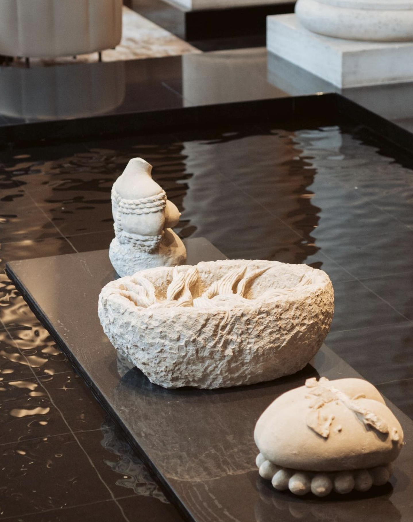 Installation view of Noriko Nakamura, Milking My Heart / Limestone, presented in the West Lounge Pools at 101 Collins Street. Photo: 101 Collins