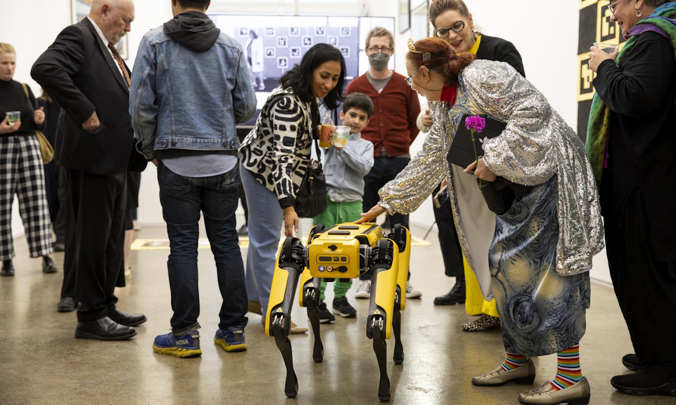 Audiences interact with the Boston Dynamics Robot Dog 'Spot', courtesy of the RMIT Health Transformation Lab. Photo: Madeleine Bishop.