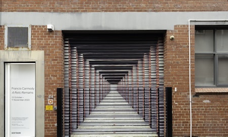 Installation view of the 2023 Glasshouse Roller Door Commission: At the end of the day, by Dan Moynihan, presented at Gertrude Glasshouse, 2023. Courtesy of the artist and Tolarno Galleries, Naarm Melbourne. Photo: Christian Capurro