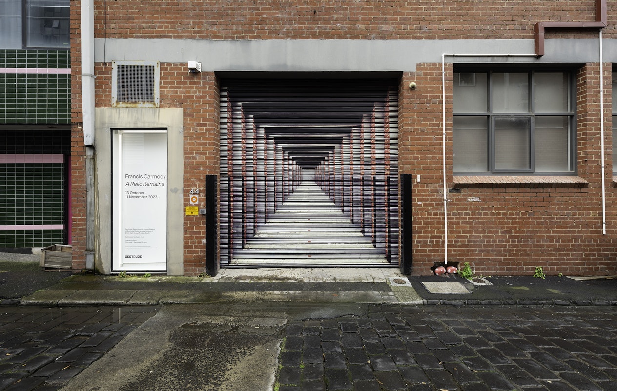 Installation view of the 2023 Glasshouse Roller Door Commission: At the end of the day, by Dan Moynihan, presented at Gertrude Glasshouse, 2023. Courtesy of the artist and Tolarno Galleries, Naarm Melbourne. Photo: Christian Capurro