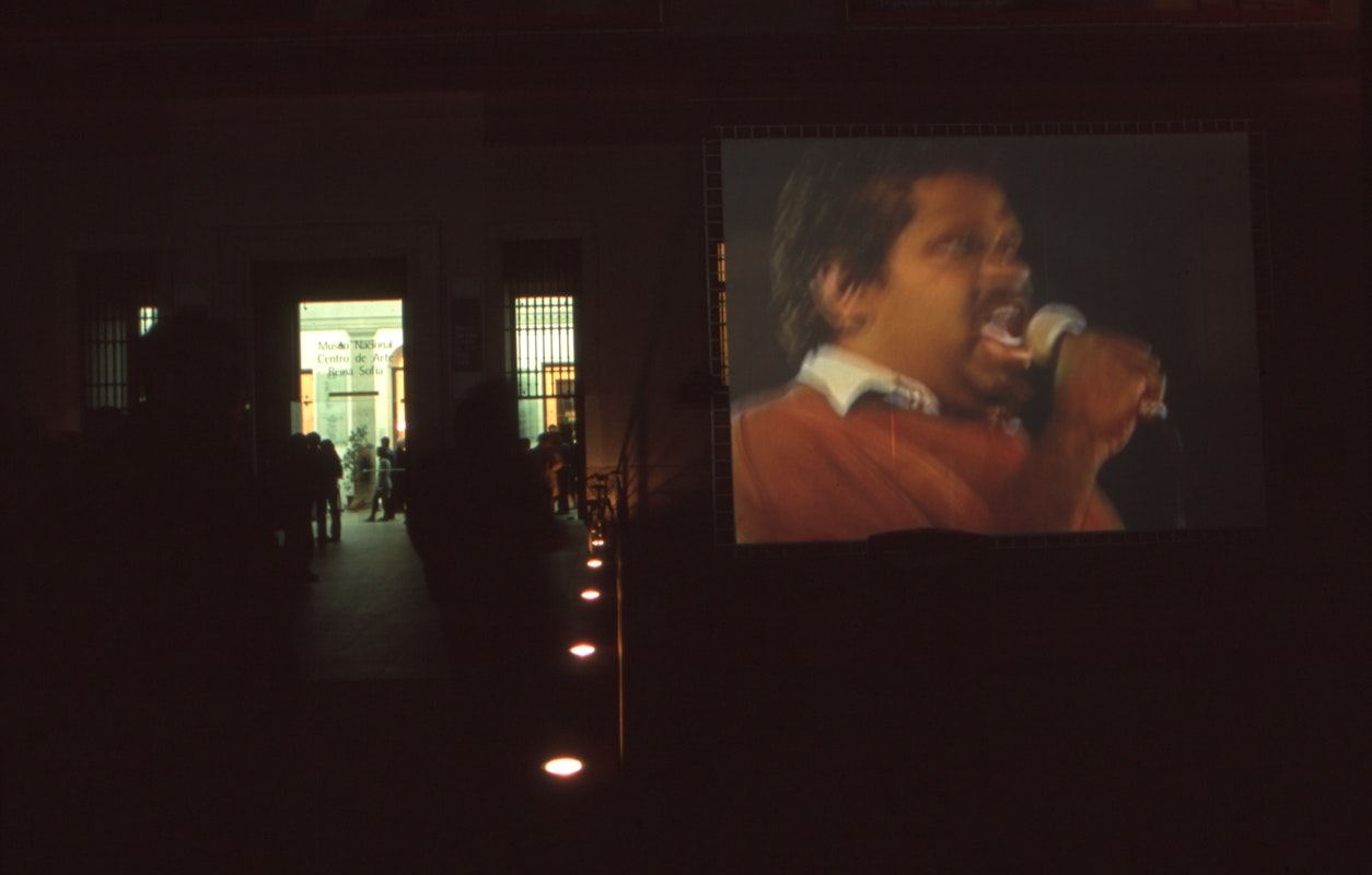 Audiences attending screen life: videos from australia, first presented at the Reina Sofia Museum, Madrid, 2002-2003. Featuring work by Ernabella Video TV / PY Media. Supported by the Australia Council, the South Australian Government and Arts SA and Arts Victoria. Photo courtesy of the Gertrude Archive.