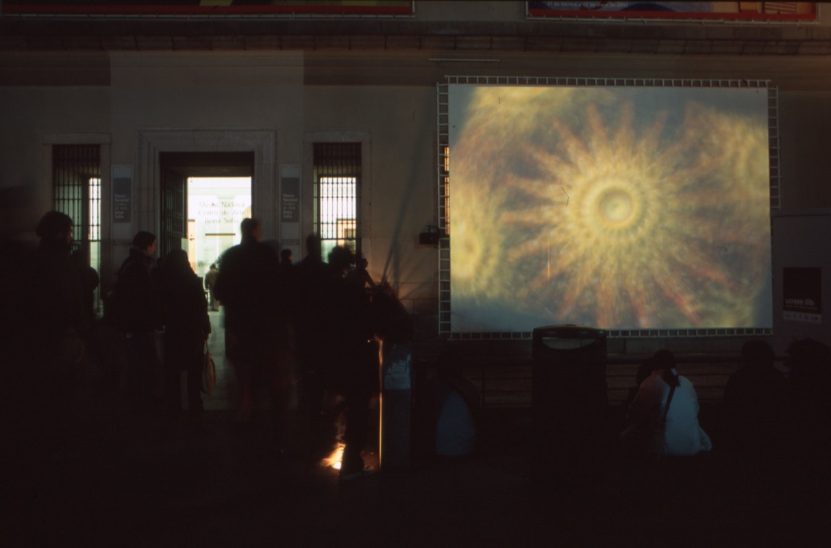 Audiences attending screen life: videos from australia, first presented at the Reina Sofia Museum, Madrid, 2002-2003. Featuring work by Peter Callas. Supported by the Australia Council, the South Australian Government and Arts SA and Arts Victoria. Photo courtesy of the Gertrude Archive.
