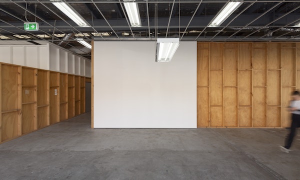 Iris Touliatou, mother light (Gertrude), 2024, installation view, And This Time the Well Is Alive, Gertrude Contemporary, Naarm Melbourne, 2024, ceiling fluorescent fixture hanging lower than existing lights in the space, image courtesy the artist and Sylvia Kouvali, Piraeus and London © the artist, photograph: Christian Capurro