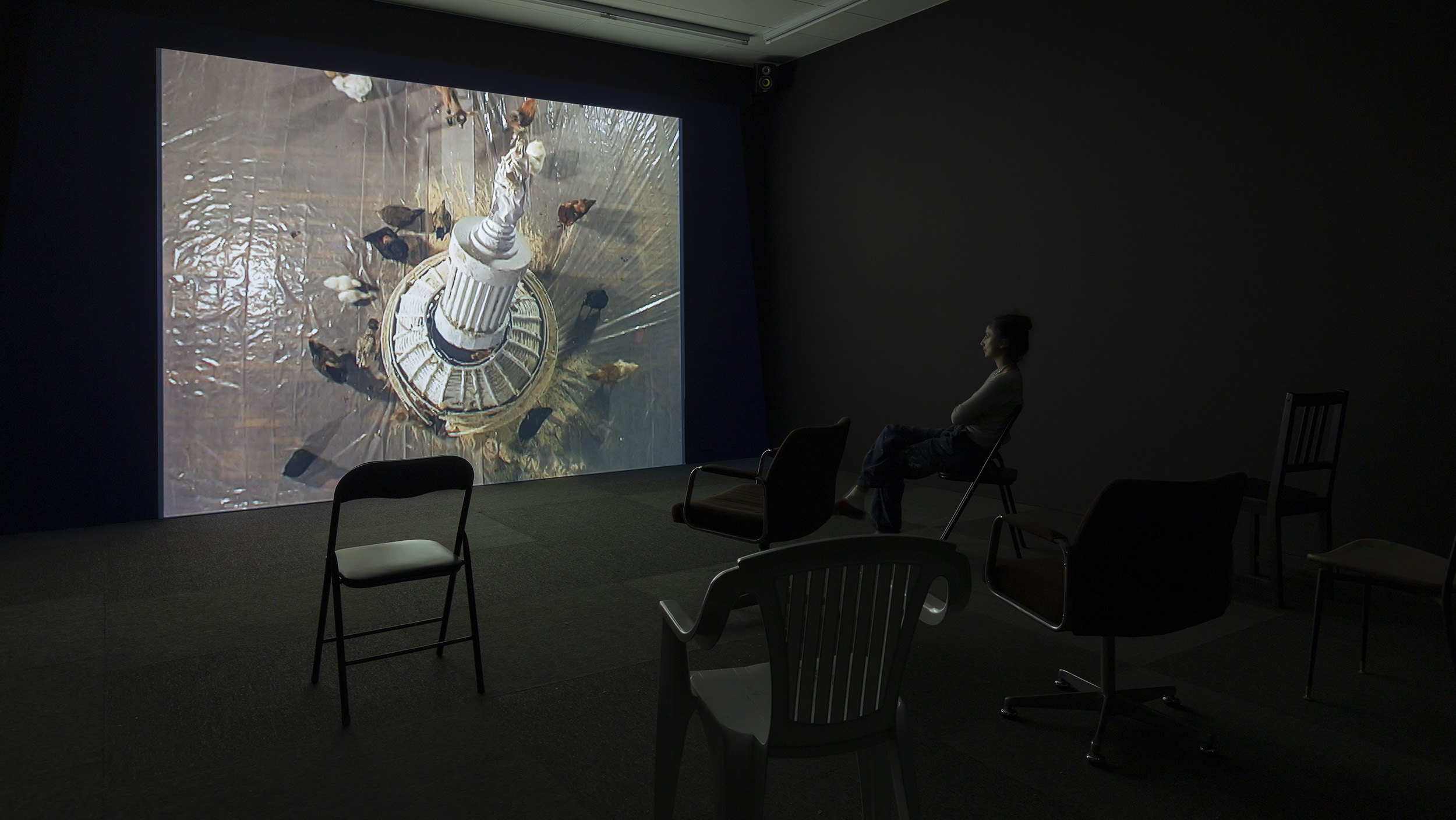 Pope.L, Small Cup, 2008, installation view, And This Time the Well Is Alive, Gertrude Contemporary, Naarm Melbourne, 2024, video with colour and sound, 12 minutes 52 seconds, image courtesy the Estate of Pope.L and Modern Art, London © the artist, photograph: Christian Capurro