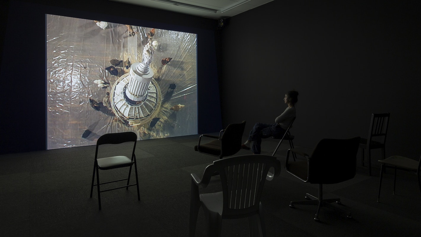 Pope.L, Small Cup, 2008, installation view, And This Time the Well Is Alive, Gertrude Contemporary, Naarm Melbourne, 2024, video with colour and sound, 12 minutes 52 seconds, image courtesy the Estate of Pope.L and Modern Art, London © the artist, photograph: Christian Capurro