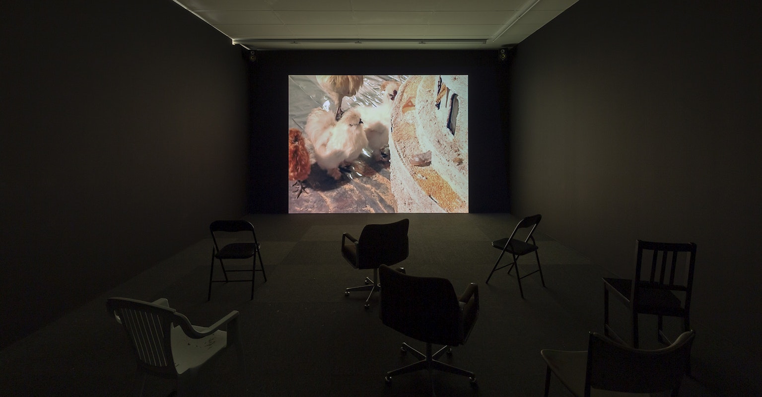 Pope.L, Small Cup, 2008, installation view, And This Time the Well Is Alive, Gertrude Contemporary, Naarm Melbourne, 2024, video with colour and sound, 12 minutes 52 seconds, image courtesy the Estate of Pope.L and Modern Art, London © the artist, photograph: Christian Capurro