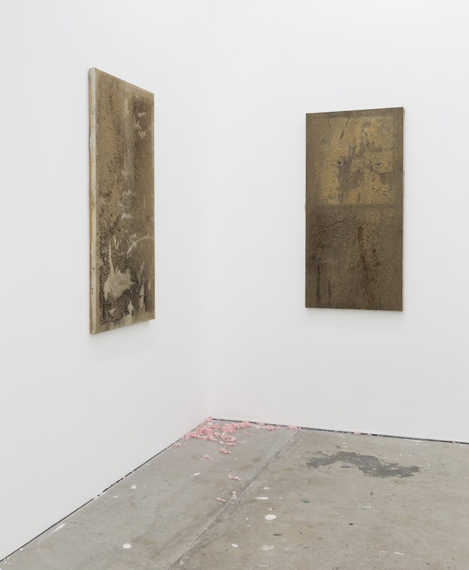 Darcy Wedd, Untitled V, 2022, Untitled II, 2022, dust (aluminium, steel, wood, acrylic, copper, brass, micarta), lemel, clear gum glue, PVA, varnish on canvas; Iris Touliatou, untitled (sweet and low) (for love or money), 2024, ground stationery, installation view, And This Time the Well Is Alive, Gertrude Contemporary, Naarm Melbourne, 2024, image courtesy and © the artists, photograph: Christian Capurro