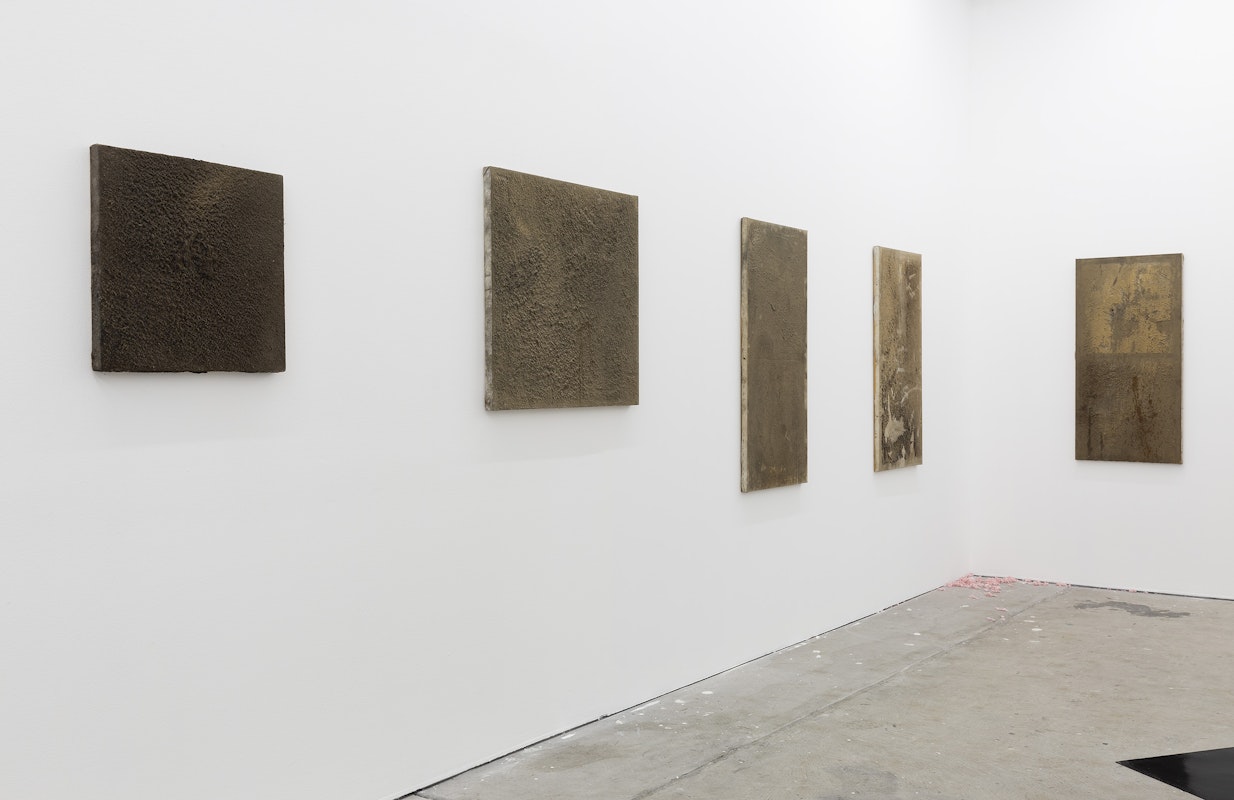 Darcy Wedd, Untitled IX, 2022, Untitled III, 2022, Untitled I, 2022, Untitled V, 2022, Untitled II, 2022, dust (aluminium, steel, wood, acrylic, copper, brass, micarta), lemel, clear gum glue, PVA, varnish on canvas; Iris Touliatou, untitled (sweet and low) (for love or money), 2024, ground stationery, installation view, And This Time the Well Is Alive, Gertrude Contemporary, Naarm Melbourne, 2024, image courtesy and © the artists, photograph: Christian Capurro