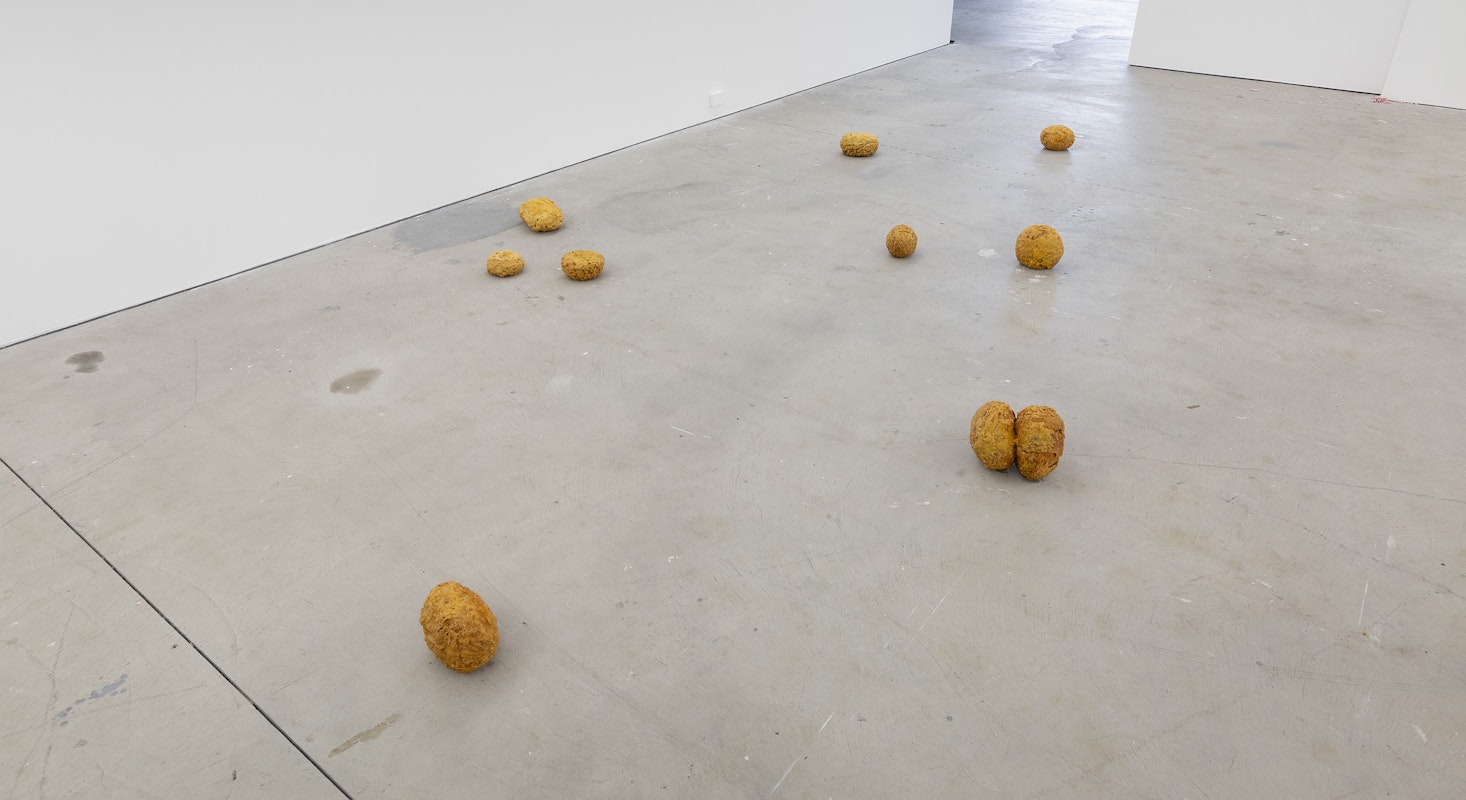 Erin Hallyburton, Oilstones, 2024, installation view, And This Time the Well Is Alive, Gertrude Contemporary, Naarm Melbourne, 2024, instant batter mix, water, vegetable oil, image courtesy and © the artist, photograph: Christian Capurro