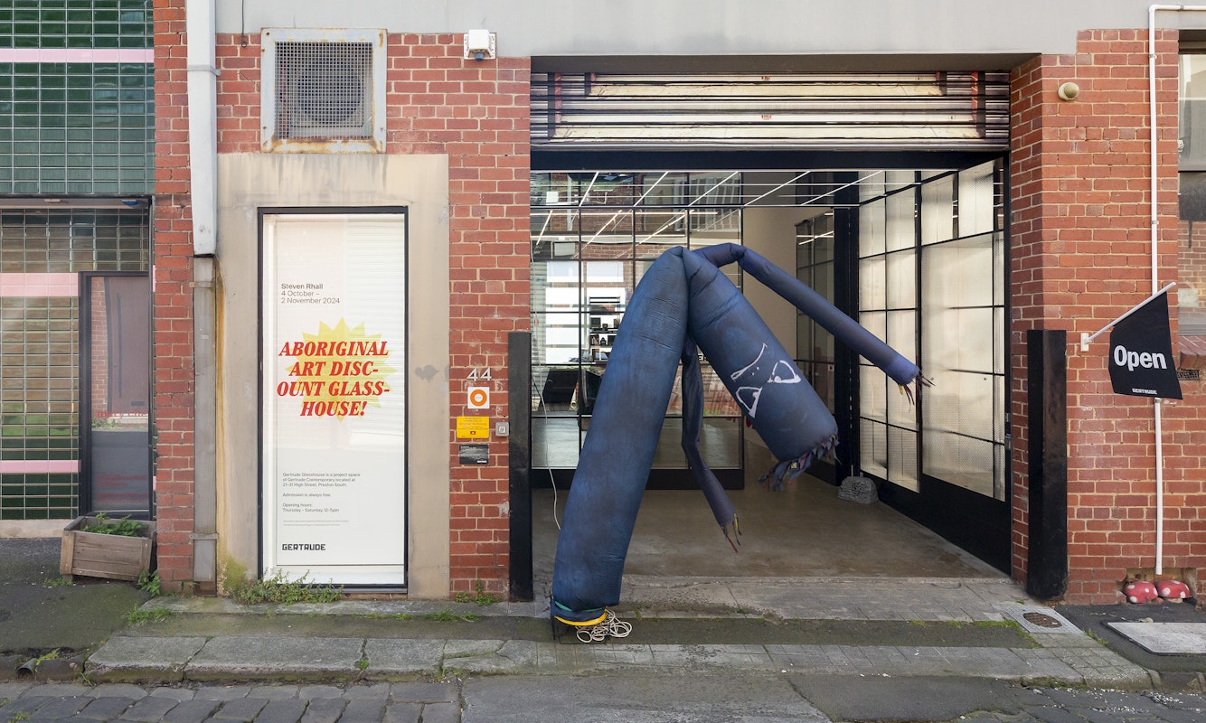 Steven Rhall, Air Dancer as Black Body (Bad Boi edition), 2019, ABORIGINAL ART DISCOUNT GLASSHOUSE, exterior view, Gertrude Glasshouse, Naarm Melbourne, 2024. Photograph: Christian Capurro