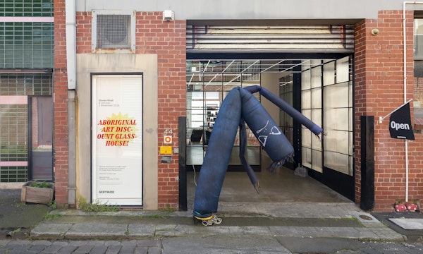Steven Rhall, Air Dancer as Black Body (Bad Boi edition), 2019, ABORIGINAL ART DISCOUNT GLASSHOUSE, exterior view, Gertrude Glasshouse, Naarm Melbourne, 2024. Photograph: Christian Capurro