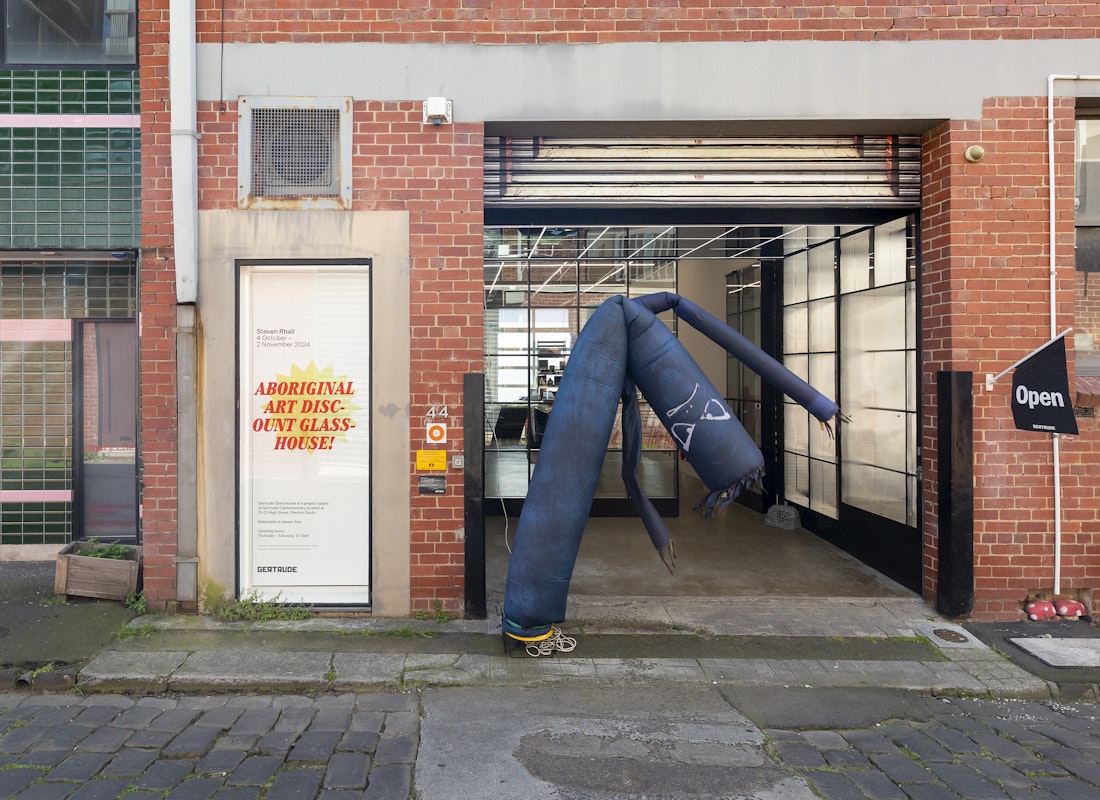 Steven Rhall, Air Dancer as Black Body (Bad Boi edition), 2019, ABORIGINAL ART DISCOUNT GLASSHOUSE, exterior view, Gertrude Glasshouse, Naarm Melbourne, 2024. Photograph: Christian Capurro