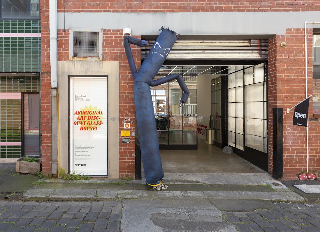 Steven Rhall, Air Dancer as Black Body (Bad Boi edition), 2019, ABORIGINAL ART DISCOUNT GLASSHOUSE, exterior view, Gertrude Glasshouse, Naarm Melbourne, 2024. Photograph: Christian Capurro