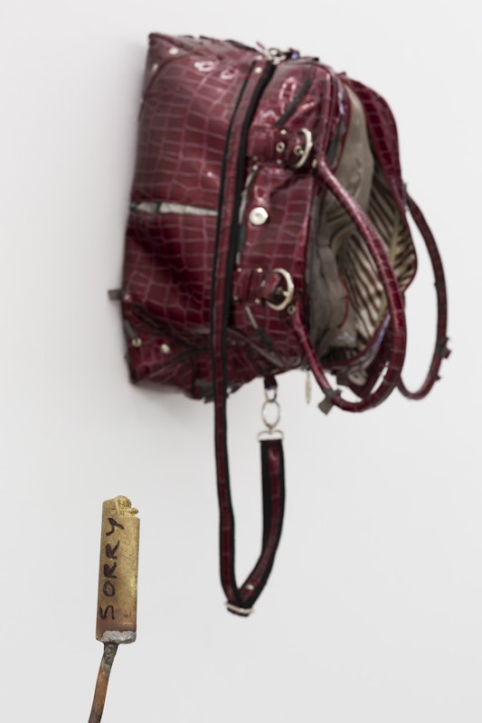 Tara Denny, with regards to all those I apologised to, 2024, found bag, leather jacket, resin, bronze, copper, permanent marker, installation view, Gertrude Studios, Gertrude Contemporary, Naarm Melbourne, 2024, image courtesy and © the artist, photograph: Christian Capurro.