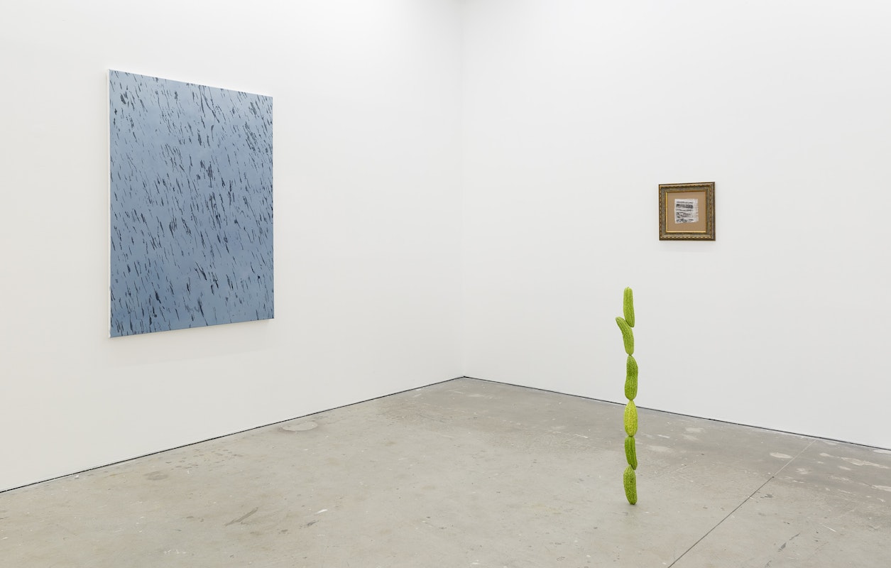 Yusi Zang, Rain Marks on Factory Wall, 2024, oil on canvas; Yusi Zang, Swallow This Bitterness, 2024, bitter melons, steel rod; Yusi Zang, Scribble While Having a Tough Conversation, 2024, drawing on cereal bag, ornamental frame, installation view, Gertrude Studios, Gertrude Contemporary, Naarm Melbourne, 2024, image courtesy and © the artist and Animal House Fine Arts, Naarm Melbourne, photograph: Christian Capurro.