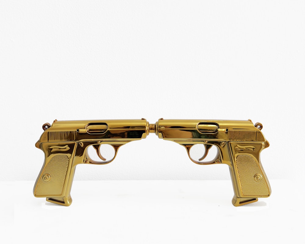 Chunxiao Qu, We kissed, 2025, photopolymer resin, polished metallic gold finish, image courtesy of the artist and FUTURES, Naarm Melbourne © the artist.