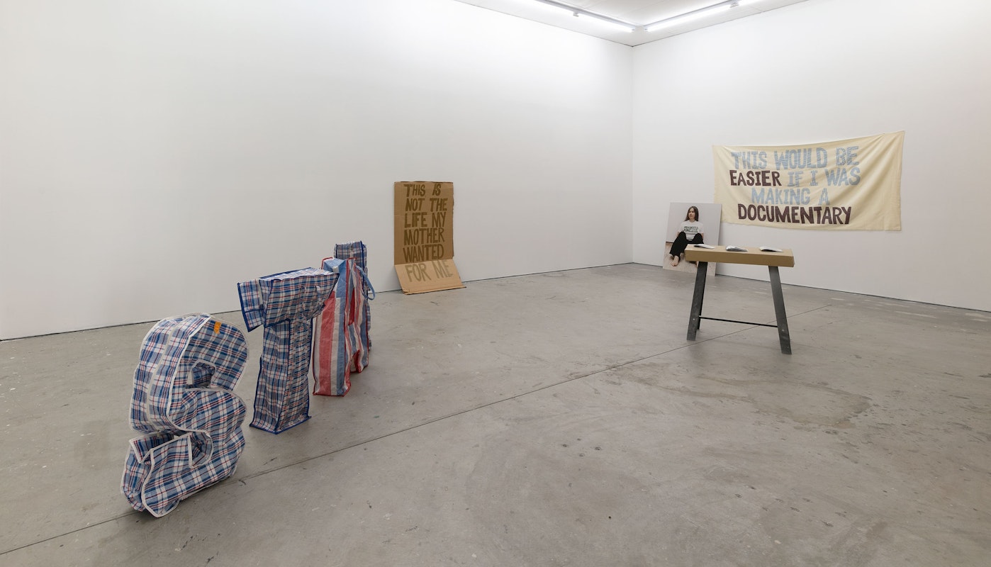 Raquel Ormella, Living in Other People’s Houses, 2002, installation view, 1964, 1969, 1977, 1995, 2000, 2005, 2025, Gertrude Contemporary, Naarm Melbourne, 2025, cardboard, acrylic paint, type C photograph mounted on aluminium, plastic shopping bags, cotton on flannelette, photocopied A6 zines, image courtesy the artist and Milani Gallery, Meanjin Brisbane © the artist, photograph: Christian Capurro.