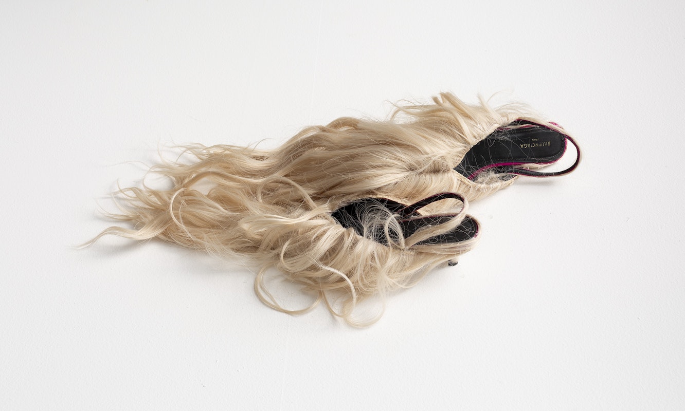 Chunxiao Qu, Wig Shoes No. 2, Balenciaga shoes, synthetic wig, 30 x 8 x 10 cm, courtesy of the artist and FUTURES, Naarm Melbourne, installation view, Gertrude Glasshouse, Naarm Melbourne, 2025, photography: Christian Capurro