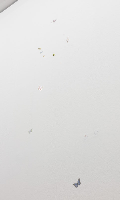 Holly Childs, Danklands [Swamped], 2025, , installation view, Of Stadiums and Construction Sites (Ne change rien pour que tout soit différent), Gertrude Contemporary, Naarm Melbourne, 2025, performance index, stickers, image courtesy and © the artist, photograph: Christian Capurro