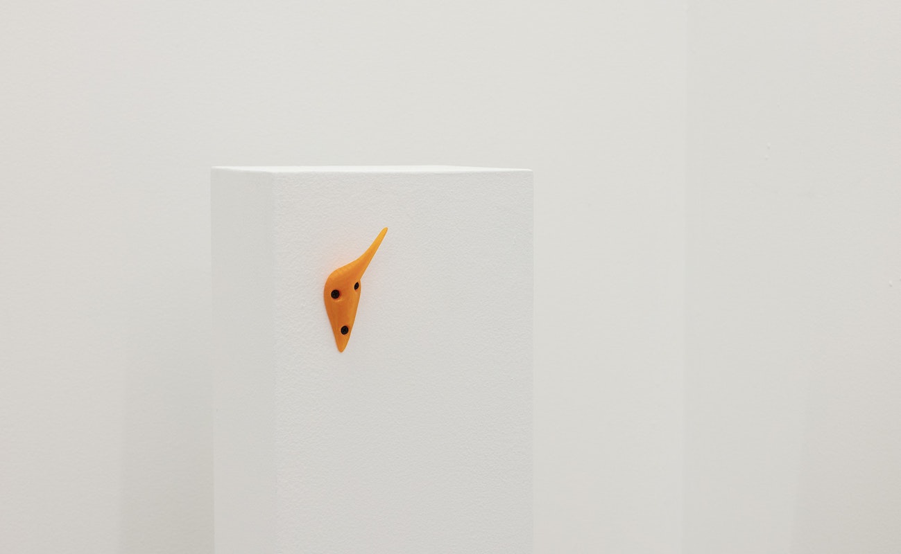 James Deutsher and LAC, Orange Design v3 (Villa ZERO LEVEL hook), 2024, installation view, Of Stadiums and Construction Sites (Ne change rien pour que tout soit différent), Gertrude Contemporary, Naarm Melbourne, 2025, 3D printed filament, screws, image courtesy of the artist and Villa ZERO LEVEL © the artist, photograph: Christian Capurro
